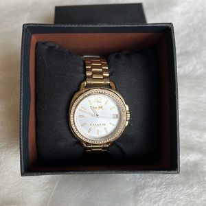 Gold coach watch